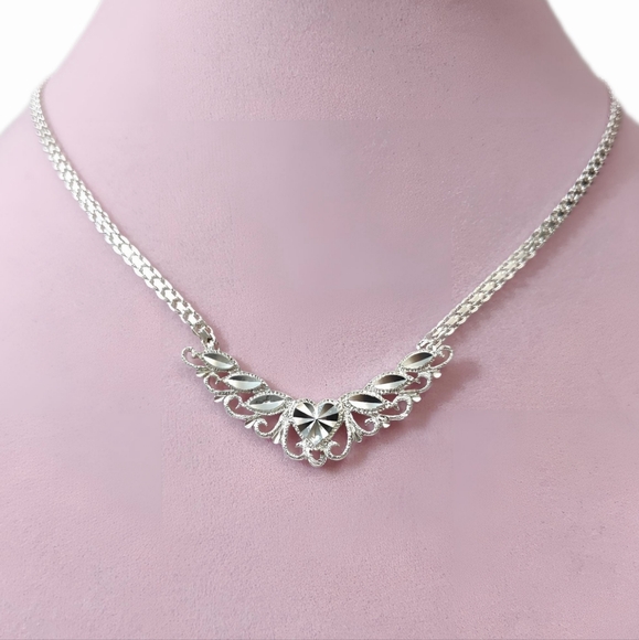 Vintage Jewelry - Vintage Sterling BEVERLY HILLS SILVER Filigree Diamond cut Heart Motif Necklace